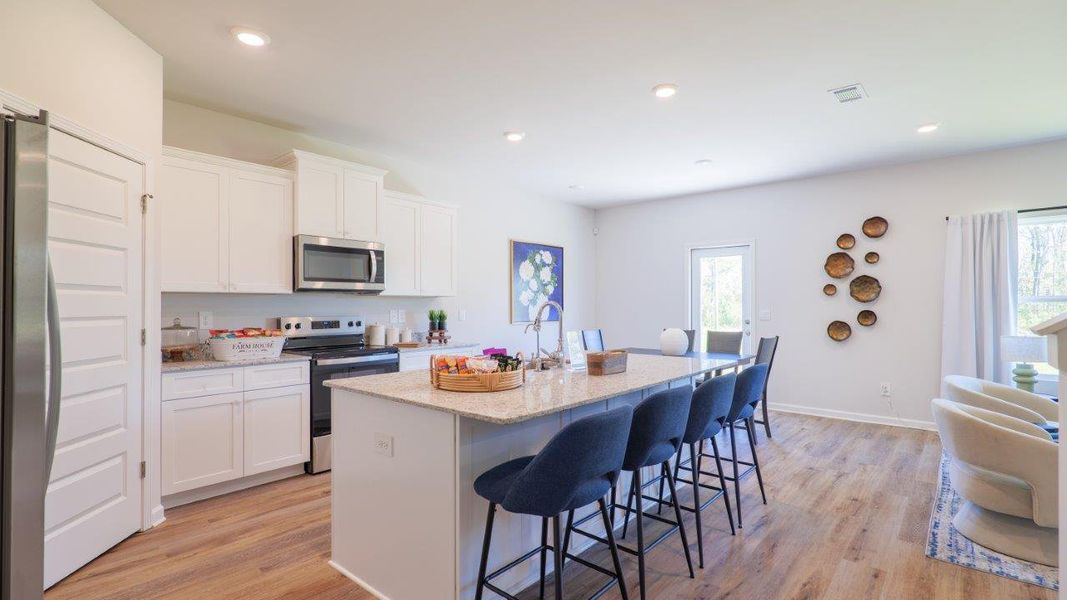Representative furnished interior of a home built from the The Carol by D.R. Horton in Olson Ridge, Tallahassee (Image 6).