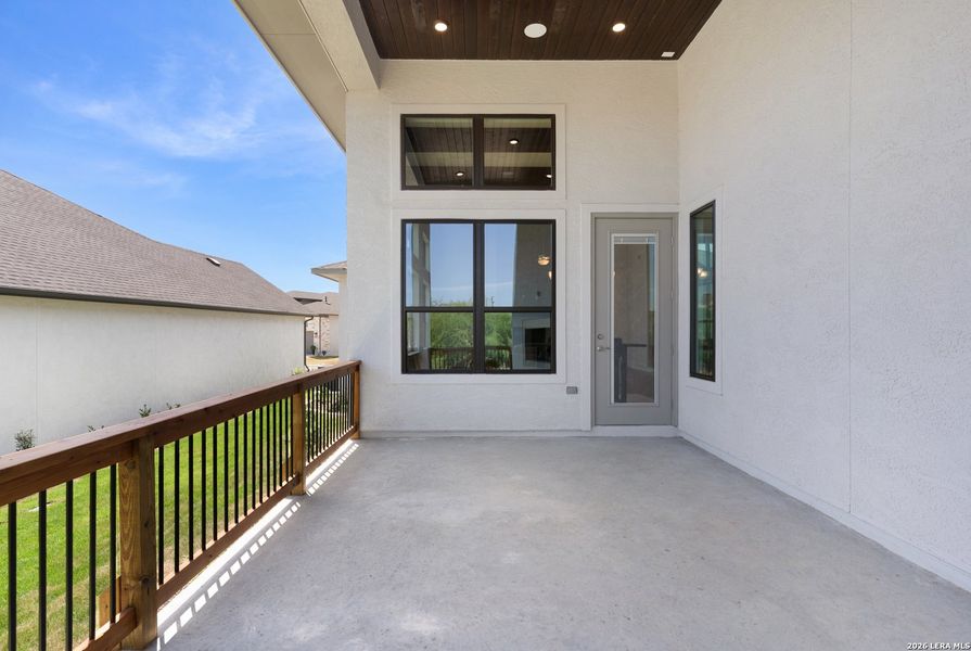 Exterior details and patio area of a home in El Sonido at Campanas, San Antonio (Image 4). Exterior details and patio area of a home in El Sonido at Campanas, San Antonio (Image 4).