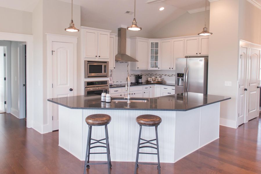 Representative furnished interior of a home built from the Helmsley by Bill Clark Homes in The Sanctuary at Sunset Beach, Sunset Beach (Image 39). Representative furnished interior of a home built from the Helmsley by Bill Clark Homes in The Sanctuary at Sunset Beach, Sunset Beach (Image 39).
