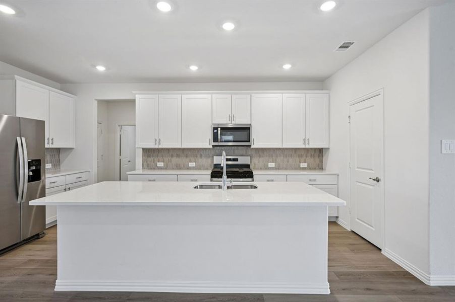 Photo is not of the actual home, but is an inspirational photo of builder’s model home and may depict options, furnishings, and/or decorator features that are not included.