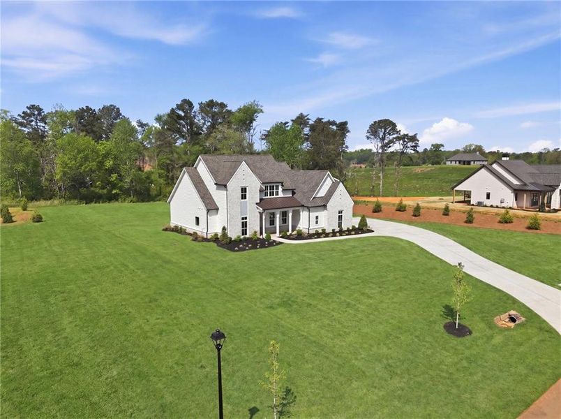Front exterior of a new home in , Rydal, GA, highlighting curb appeal (Image 30).