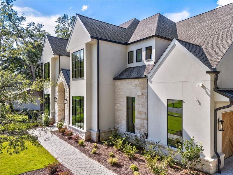 Front exterior of a new home in , Alpharetta, GA, highlighting curb appeal (Image 27). Front exterior of a new home in , Alpharetta, GA, highlighting curb appeal (Image 27).