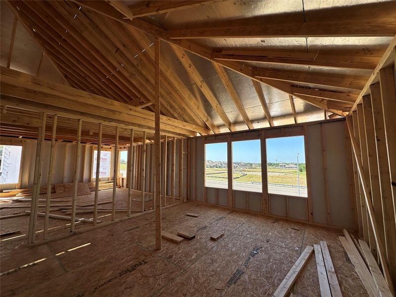 The framed construction of this dwelling hints at future possibilities with open spaces and plentiful natural light. The framed construction of this dwelling hints at future possibilities with open spaces and plentiful natural light.