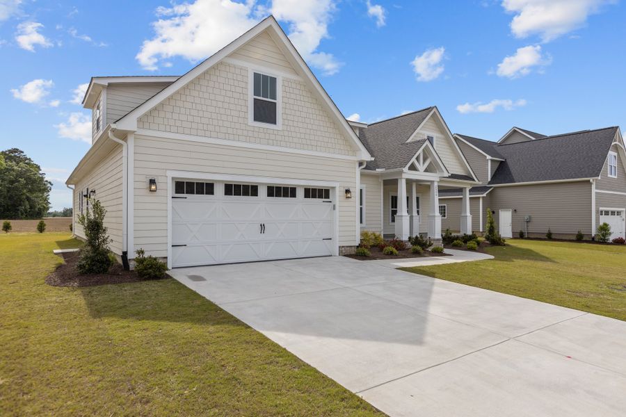 Representative exterior photo of a completed home built from the Haddock by Bill Clark Homes in Laurel Oaks, Greenville, NC (Image 28).