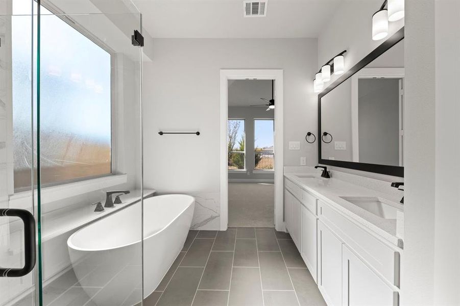 Furnished interior view inside a new home in The Villages of Hurricane Creek, Anna (Image 13).