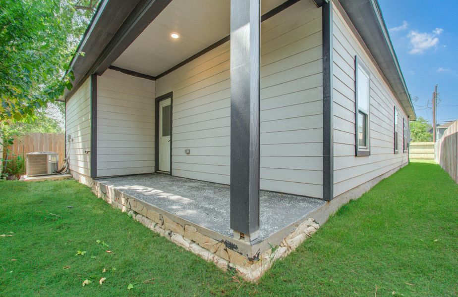 Exterior details and patio area of a home in , Houston (Image 19). Exterior details and patio area of a home in , Houston (Image 19).