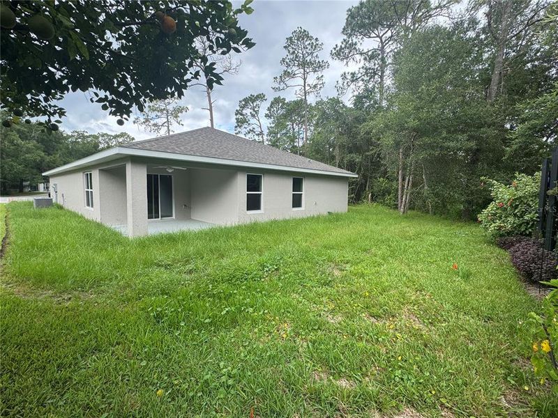 Front exterior of a new home in , Dunnellon, FL, highlighting curb appeal (Image 17).