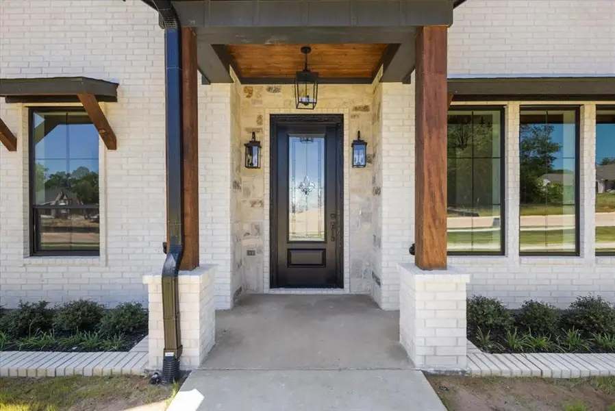 Exterior details and patio area of a home in , Lindale (Image 4).