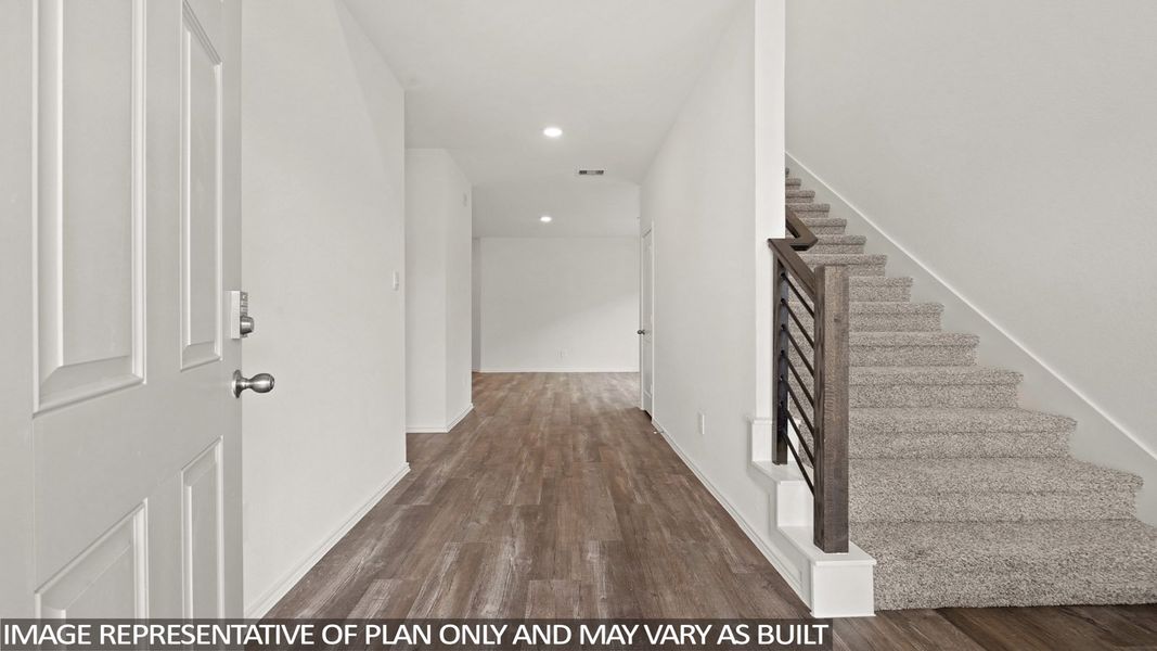 Spacious, unfurnished interior of a new home in Sunterra, Katy (Image 13).