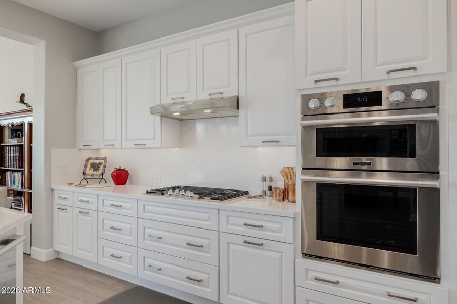 Upgraded cabinets, Quarts counters