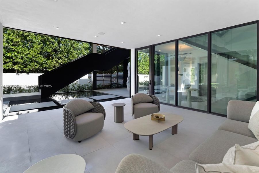 Exterior details and patio area of a home in , Miami Beach (Image 31). Exterior details and patio area of a home in , Miami Beach (Image 31).