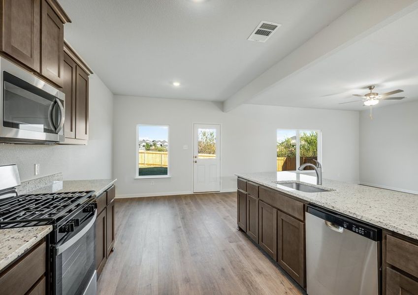 The dining room sits right off of the kitchen.