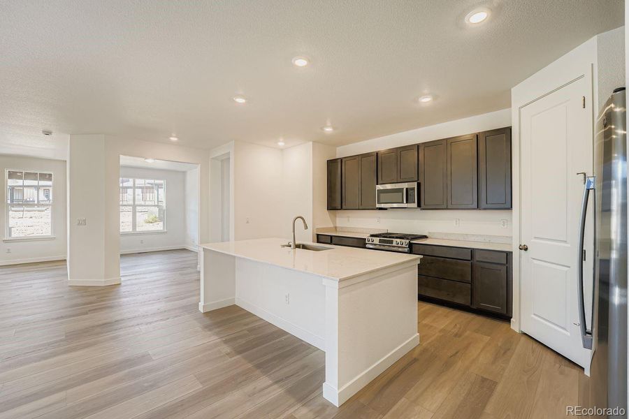 Furnished interior in a model home at Ken-Caryl Ranch: The Monarch Collection in Littleton (Image 9).