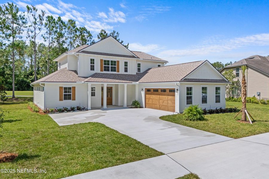 Front exterior of a new home in , Orange Park, FL, highlighting curb appeal (Image 20).