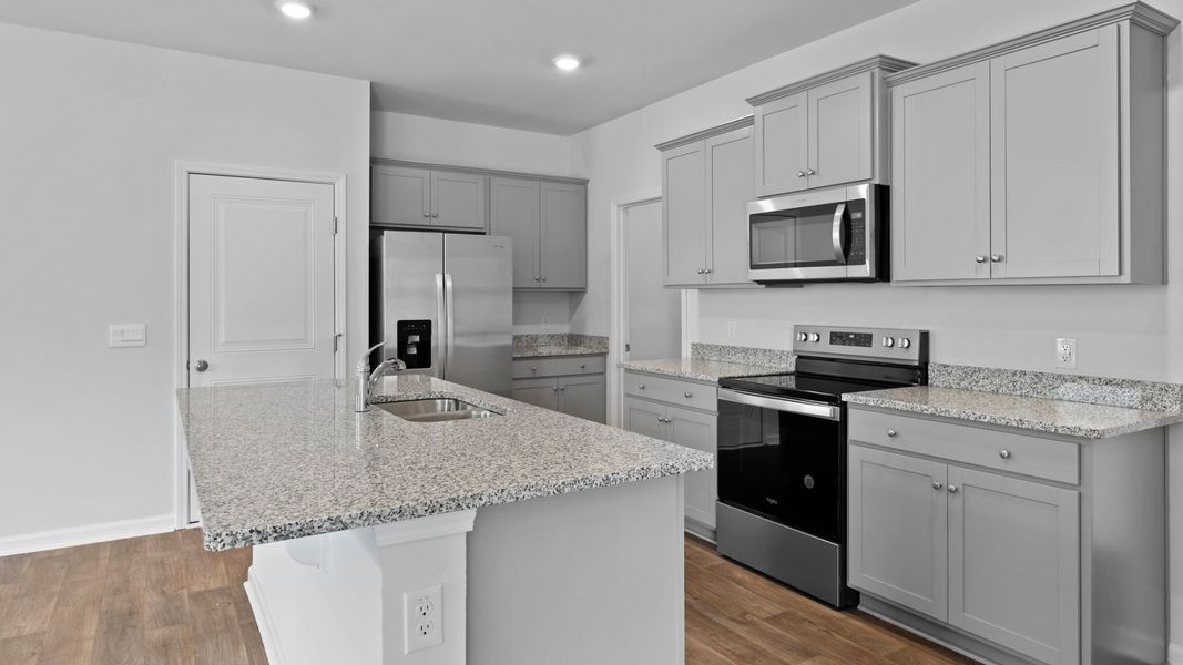 Representative furnished interior of a home built from the ROBIE by D.R. Horton in Hillcrest, Ravenel (Image 5).