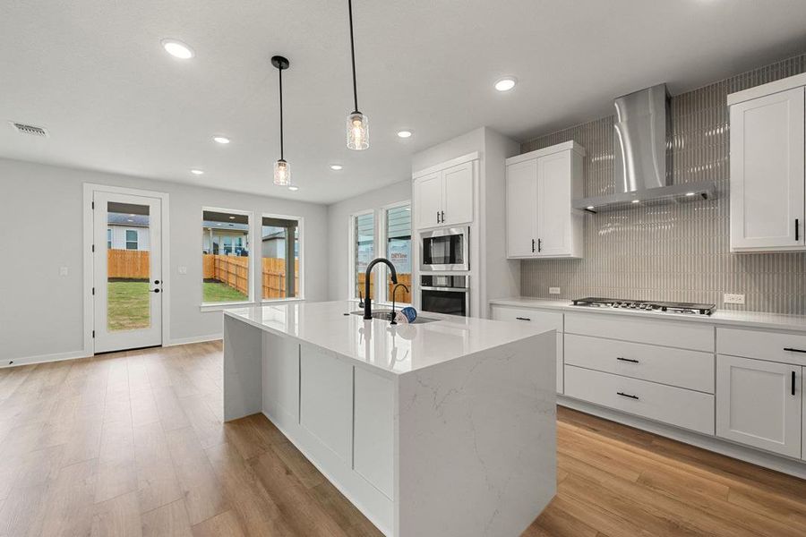 Furnished interior view inside a new home in Heritage, Dripping Springs (Image 8).