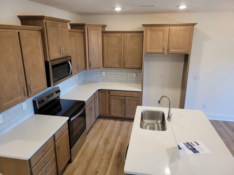 Furnished interior view inside a new home in 1158 Place Townhomes, Wilson (Image 5).
