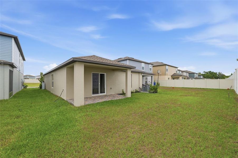 Exterior details and patio area of a home in , Zephyrhills (Image 3).