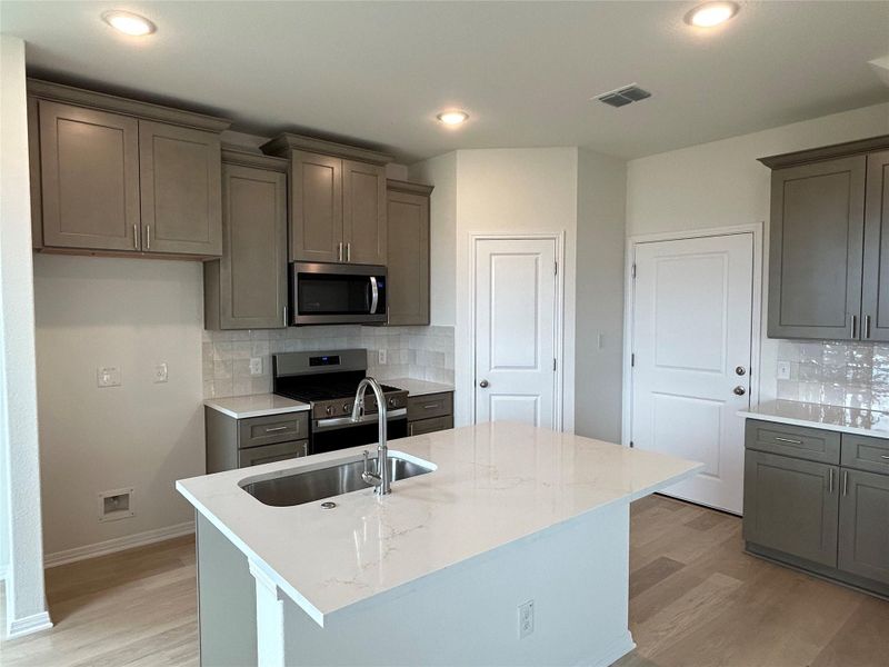 Photos of similar home. Actual home under construction.
