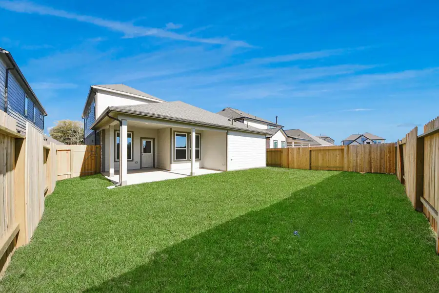 Come and see this spacious backyard with its beautiful covered patio. There is plenty of room for the kids to play and adults to relax. Perfect for your outdoor living space, patio furniture, bbq pit, and so much more. The possibilities are endless!