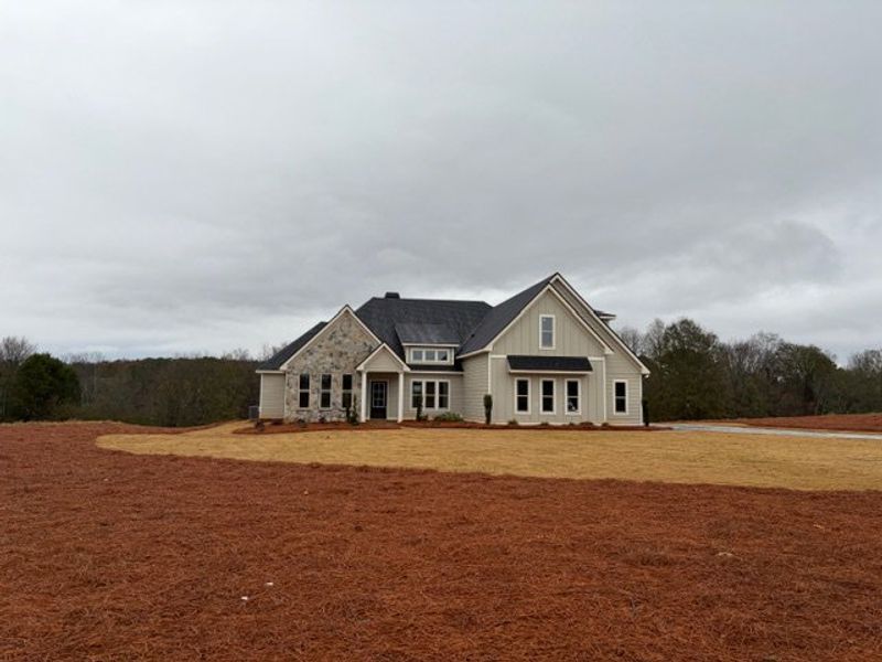 Front exterior of a new home in Blackwelder Bluff, Bowdon, GA, highlighting curb appeal (Image 13).