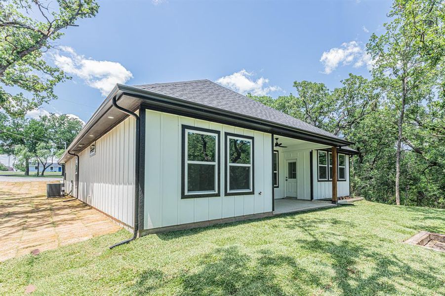 Exterior details and patio area of a home in , Runaway Bay (Image 21).