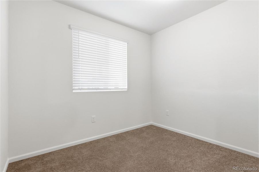 Spacious, unfurnished interior of a new home in Reunion, Commerce City (Image 14).