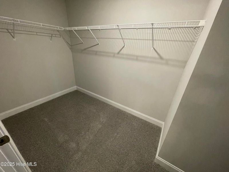 Furnished interior view inside a new home in Mill Creek Cove, Bolivia (Image 9).