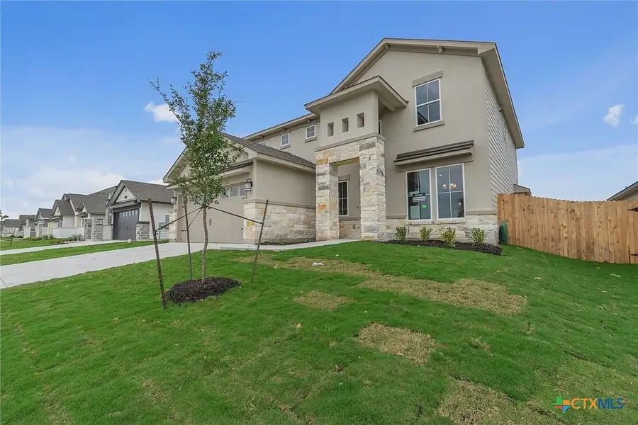 Front exterior of a new home in Levy Crossing, Killeen, TX, highlighting curb appeal (Image 2). Front exterior of a new home in Levy Crossing, Killeen, TX, highlighting curb appeal (Image 2).