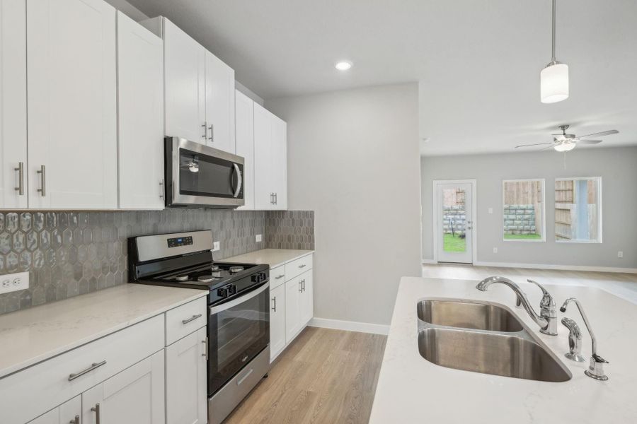 Photo is not of the actual home, but is an inspirational photo of builder’s model home and may depict options, furnishings, and/or decorator features that are not included