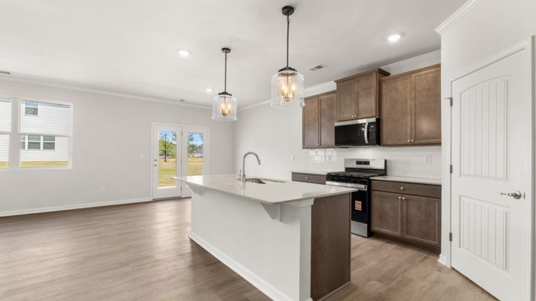 Furnished interior view inside a new home in Fairway 17 at Mirror Lake, Villa Rica (Image 11).