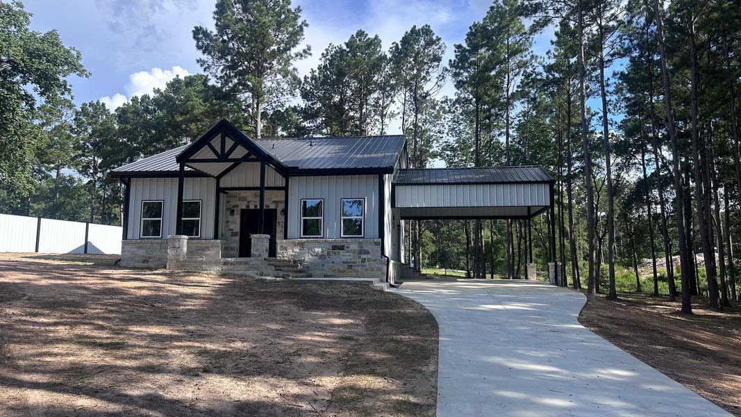 Front exterior of a new home in , Navasota, TX, highlighting curb appeal (Image 16).