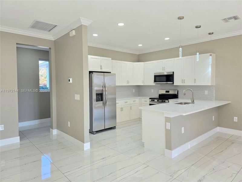 Furnished interior view inside a new home in , Lehigh Acres (Image 6).