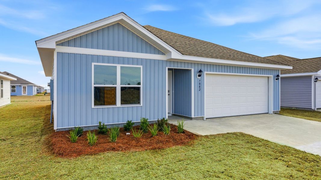 Front exterior of a new home in Liberty, Panama City, FL, highlighting curb appeal (Image 18).