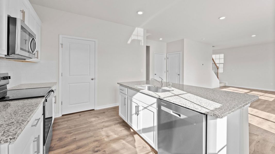 Furnished interior view inside a new home in Ridgewood Farms, Winterville (Image 5).