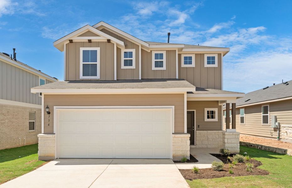 Front exterior of a new home in Sunfield, Buda, TX, highlighting curb appeal (Image 16). Front exterior of a new home in Sunfield, Buda, TX, highlighting curb appeal (Image 16).