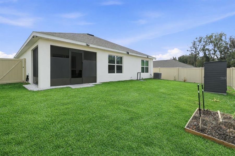 Exterior details and patio area of a home in Autumn Glen, Belleview (Image 17).