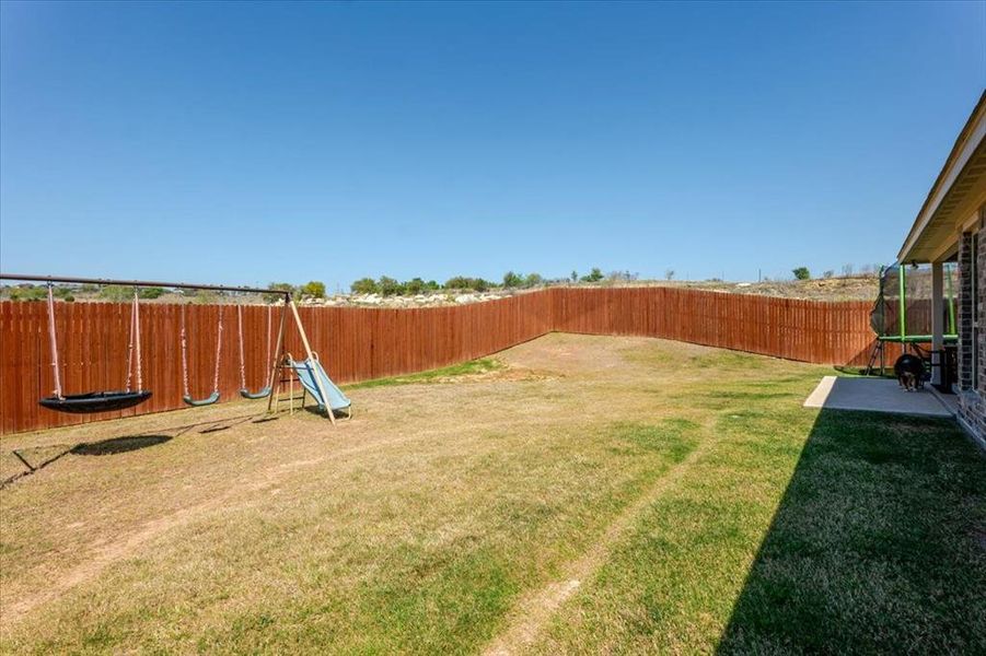 Exterior details and patio area of a home in , Glen Rose (Image 26).