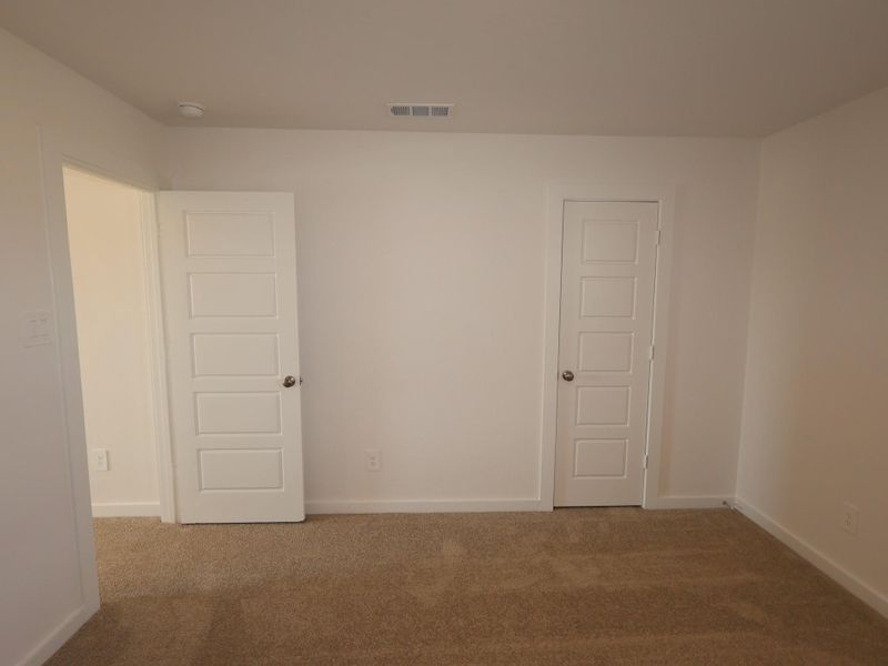 Spacious, unfurnished interior of a new home in Pinewood at Grand Texas, New Caney (Image 7).