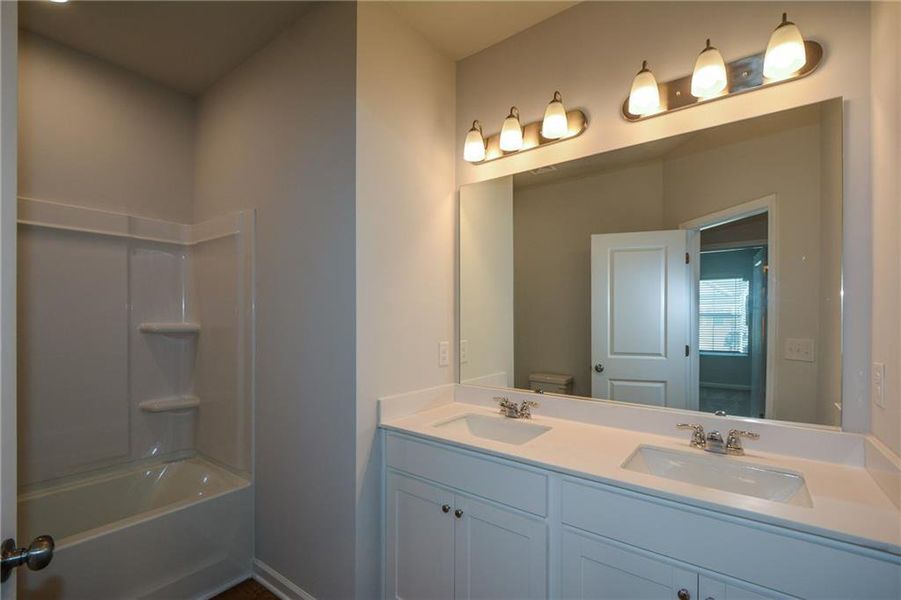 Furnished interior view inside a new home in Graystone Village, Grayson (Image 16).