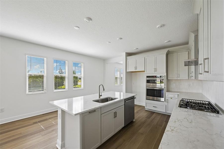 Furnished interior view inside a new home in Grand Park, Sarasota (Image 6).