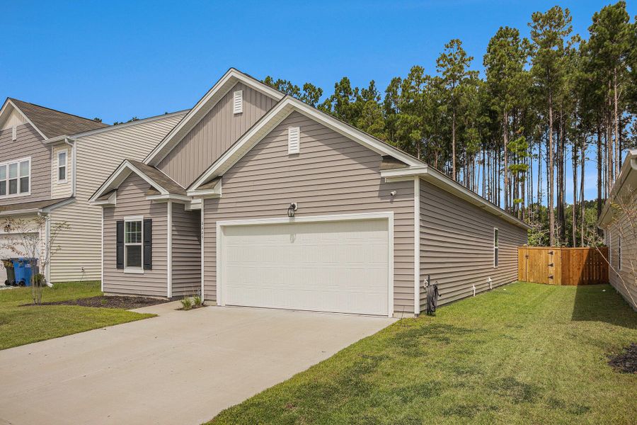 Front exterior of a new home in , Summerville, SC, highlighting curb appeal (Image 2).