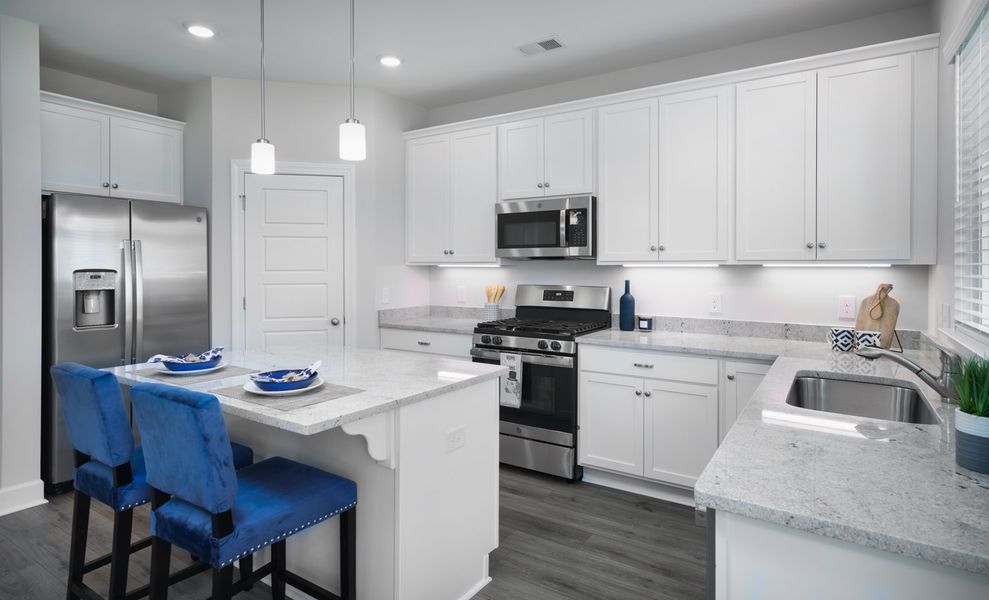 Representative furnished interior of a home built from the The Kennedy by Cothran Homes in Holly Ridge, Greenville (Image 12).