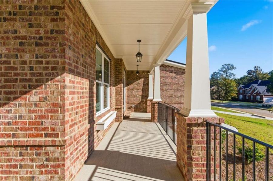 Exterior details and patio area of a home in The Estates at Hurricane Pointe, Douglasville (Image 2). Exterior details and patio area of a home in The Estates at Hurricane Pointe, Douglasville (Image 2).