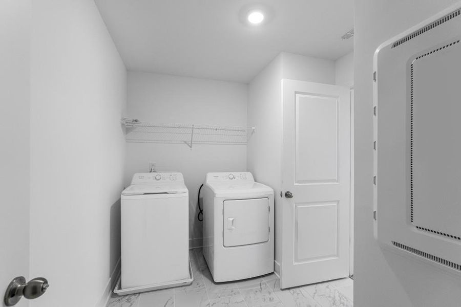 Furnished interior view inside a new home in Wellington Estates, Madison (Image 11).