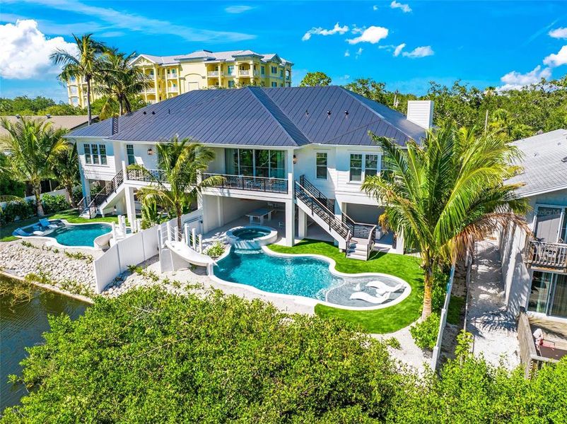 Front exterior of a new home in , Sarasota, FL, highlighting curb appeal (Image 19).