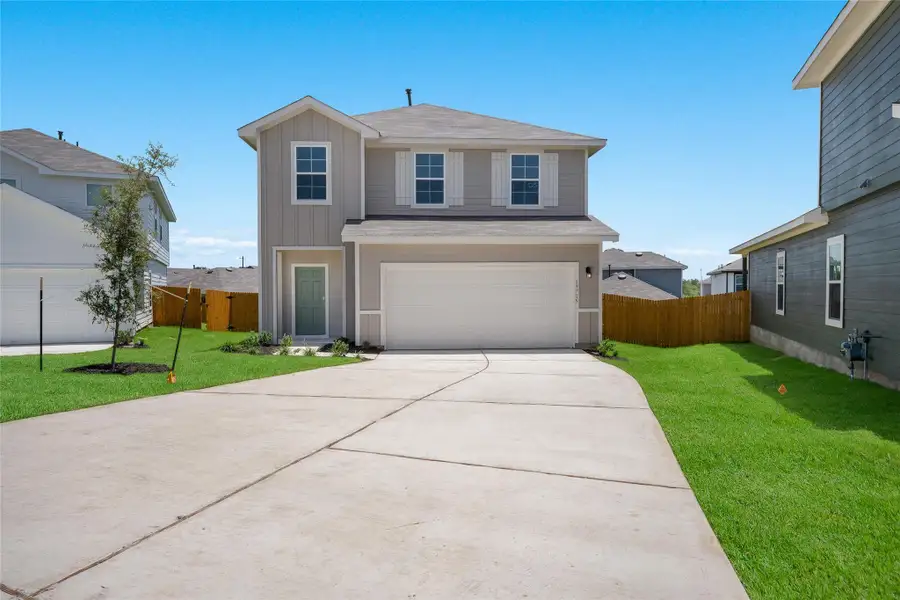 Front exterior of a new home in Durango, Mustang Ridge, TX, highlighting curb appeal (Image 1).