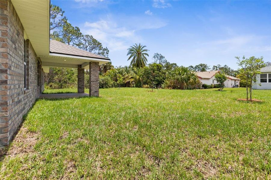 Exterior details and patio area of a home in Palm Coast, Palm Coast (Image 18). Exterior details and patio area of a home in Palm Coast, Palm Coast (Image 18).
