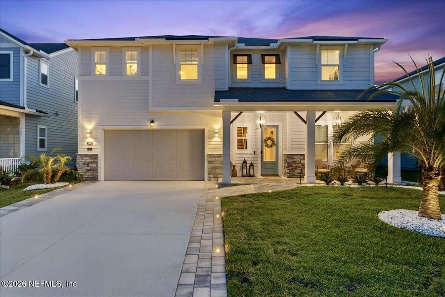Front exterior of a new home in , St. Johns, FL, highlighting curb appeal (Image 26).