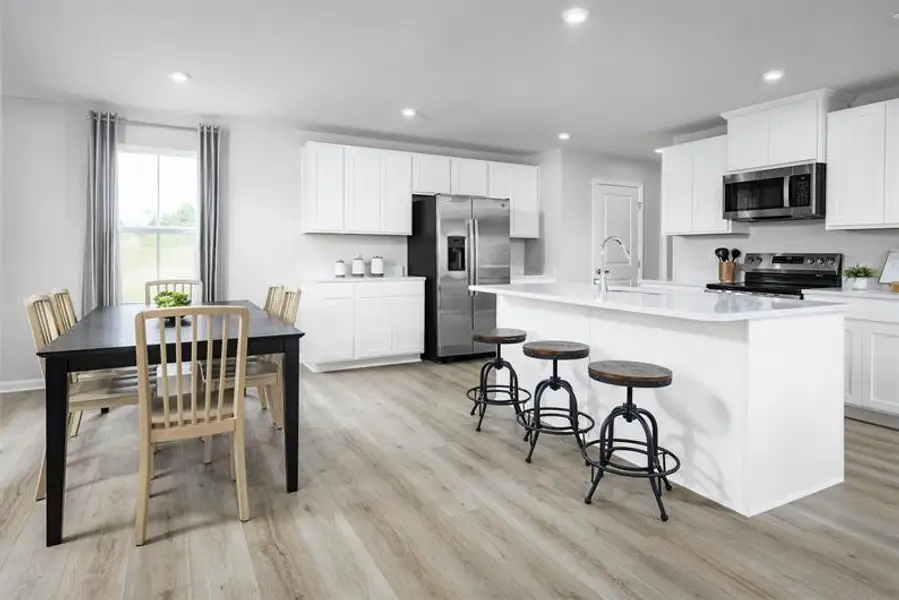 Representative furnished interior of a home built from the Torrey by Ryan Homes in Oakwood Trace, Fairburn (Image 4).